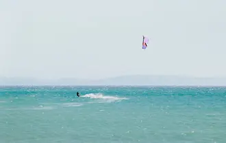 Kitesurfing at Playa de los Lances, Tarifa, Costa de la Luz, Spain.